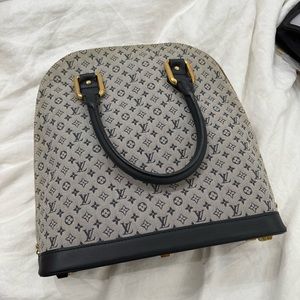 Vintage Louis Vuitton Alma in denim blue